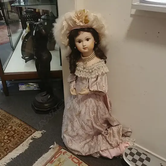 LARGE PORCELAIN DOLL ON STAND 