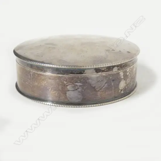 A silver powder box