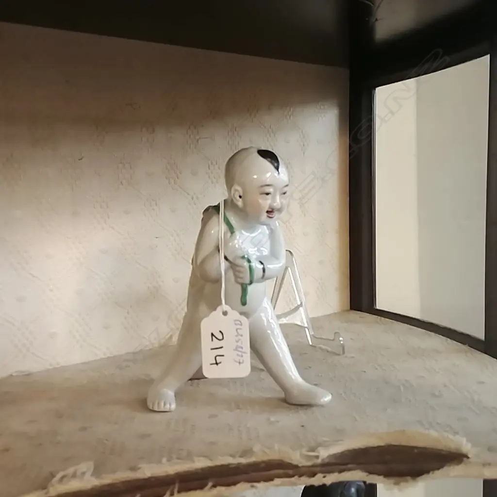 ORIENTAL PORCELAIN FIGURE OF A YOUNG BOY WITH CARP Image 1++