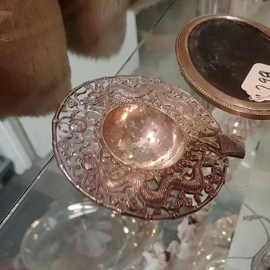 (16754)CHINESE SILVER TEA STRAINER 26GMS