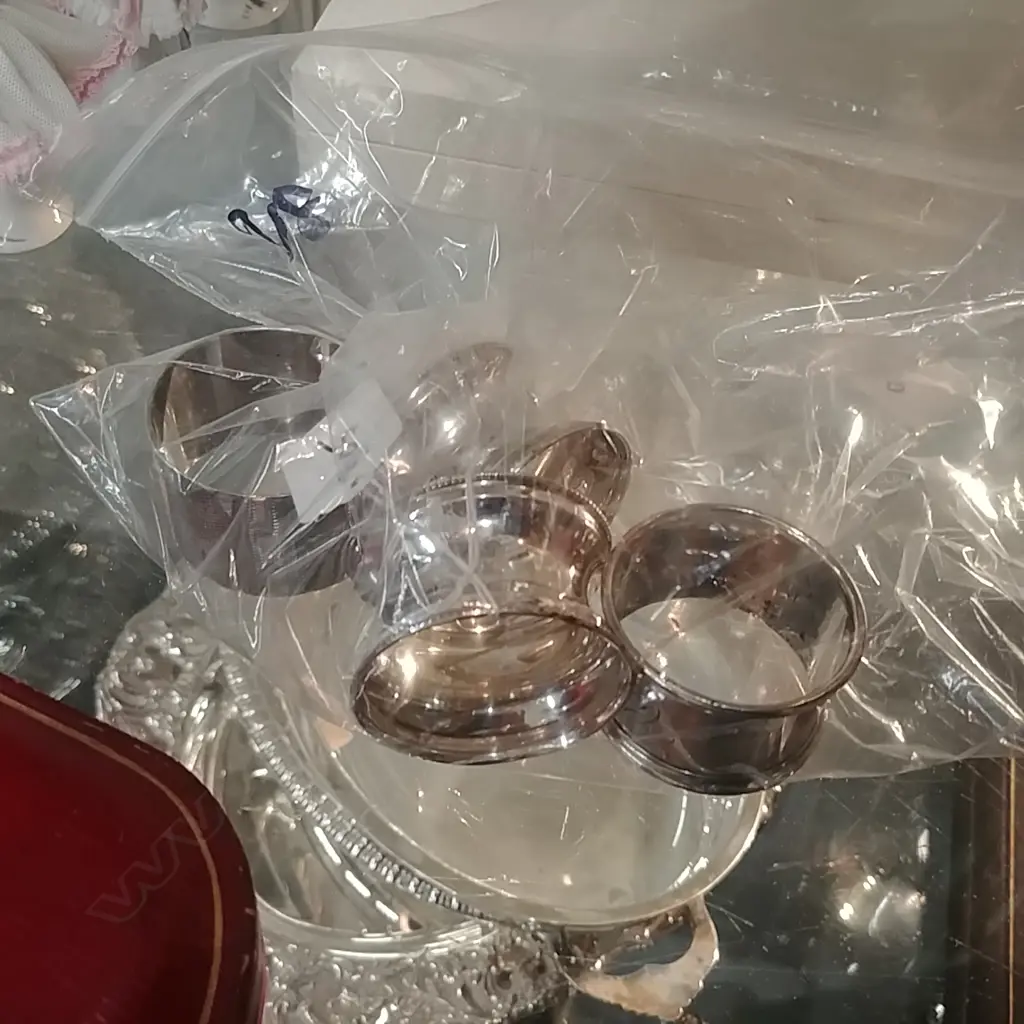 4 S/S NAPKIN RINGS Image 1++