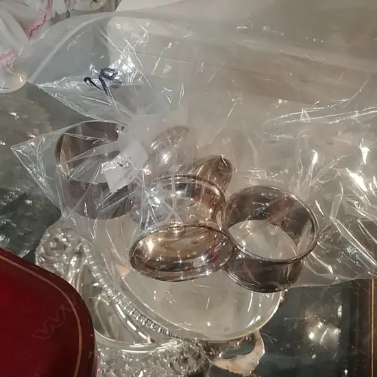 4 S/S NAPKIN RINGS