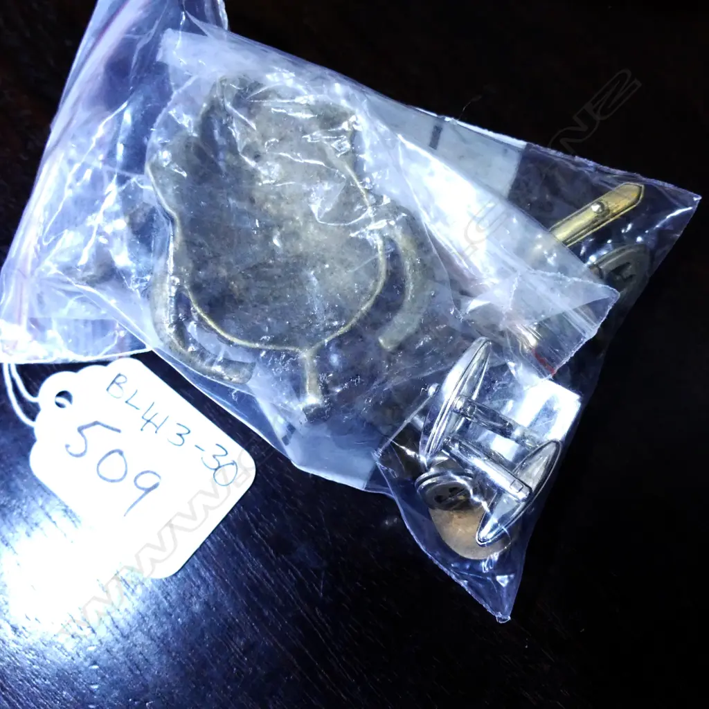 CUFFLINKS AND SMALL BRASS MASKS Image 1++