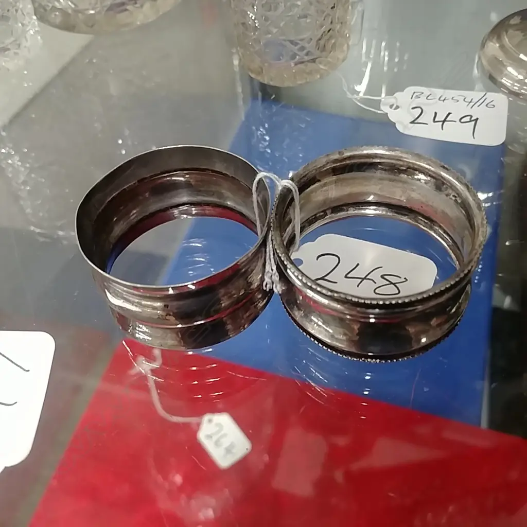 TWO SILVER NAPKIN RINGS Image 1++