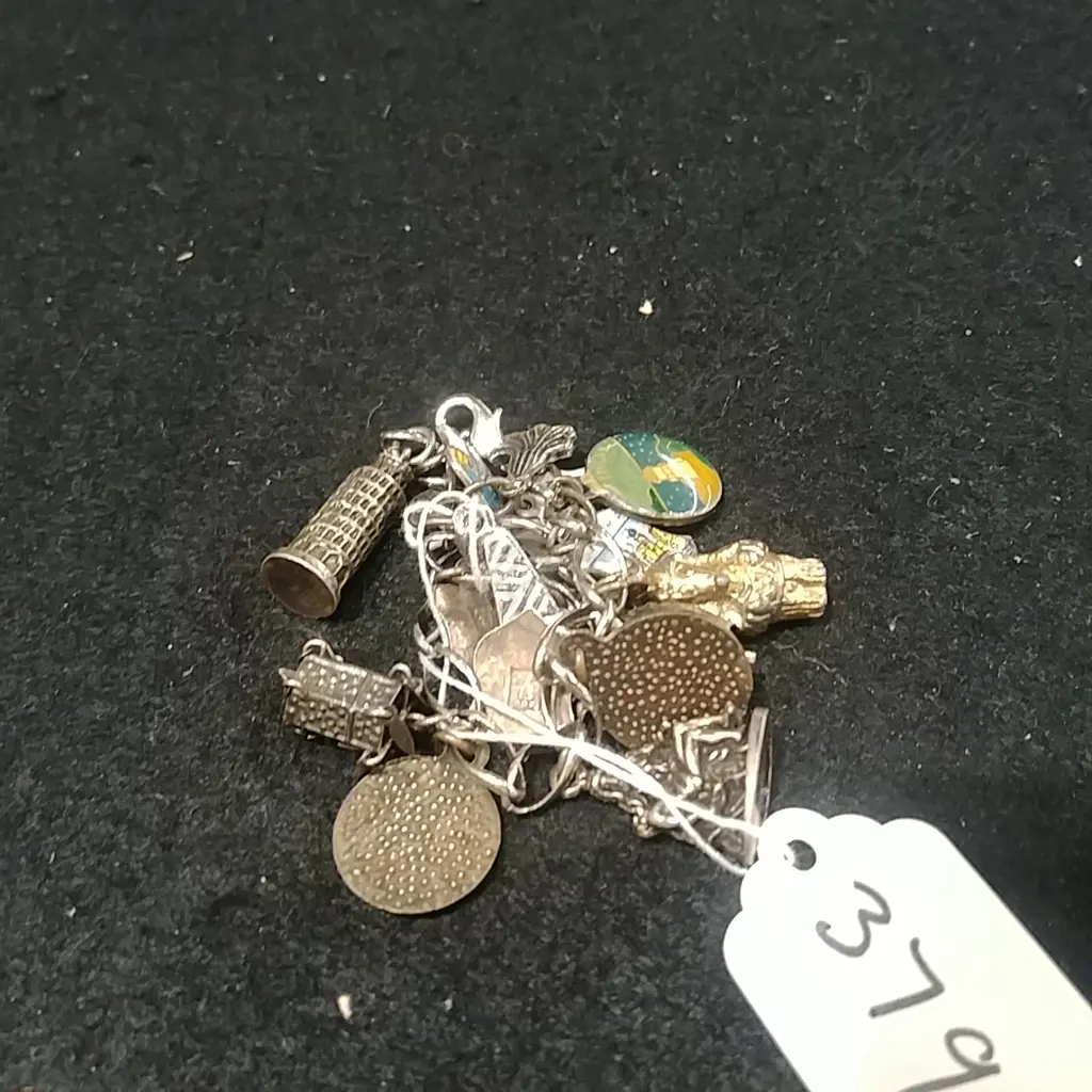 CHARM BRACELET W/ SOME .800 CHARMS  Image 1++