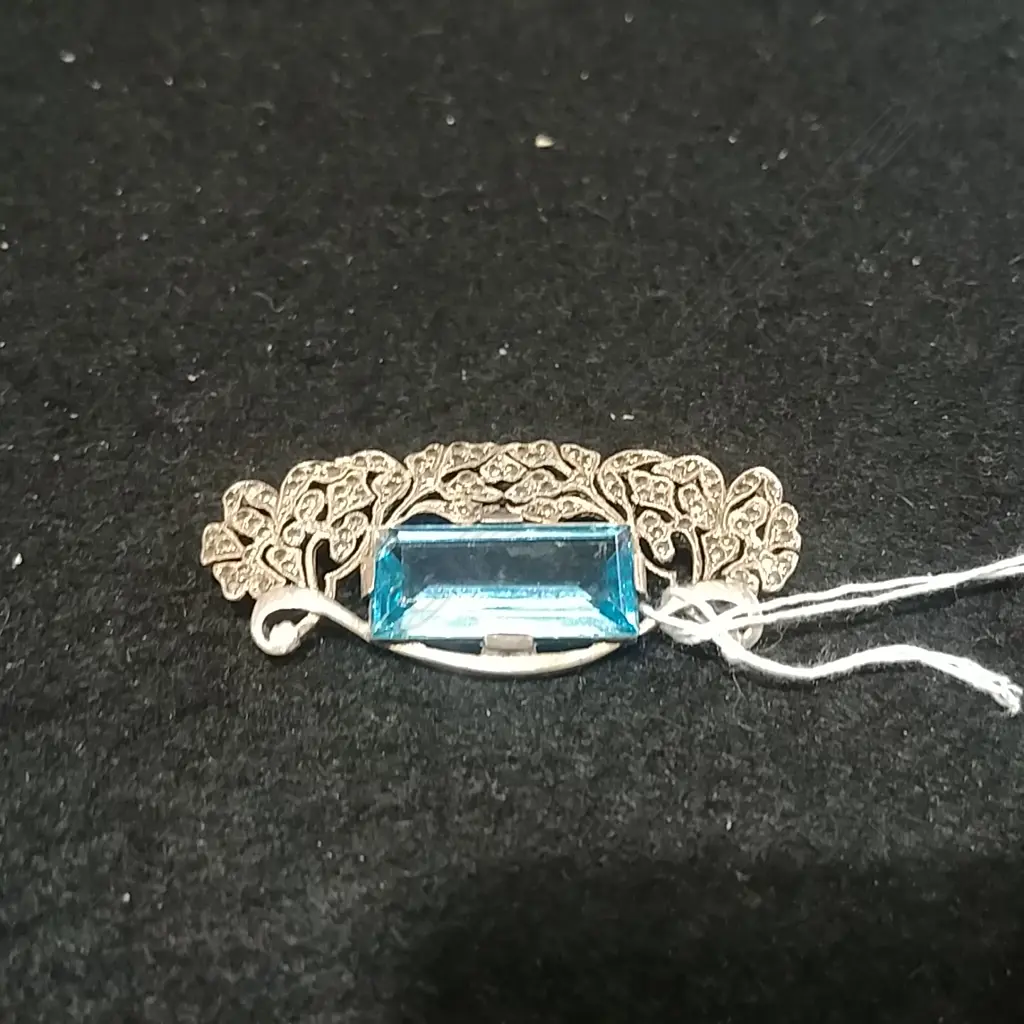 SILVER MARQUSITE BROOCH WITH BLUE STONE Image 1++