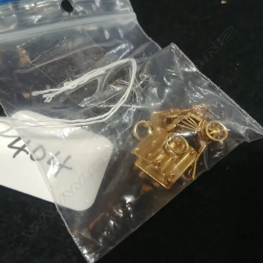 3 GOLD CHARMS MARKED 18 AND 14 CT ONE UNMARKED Image 1++