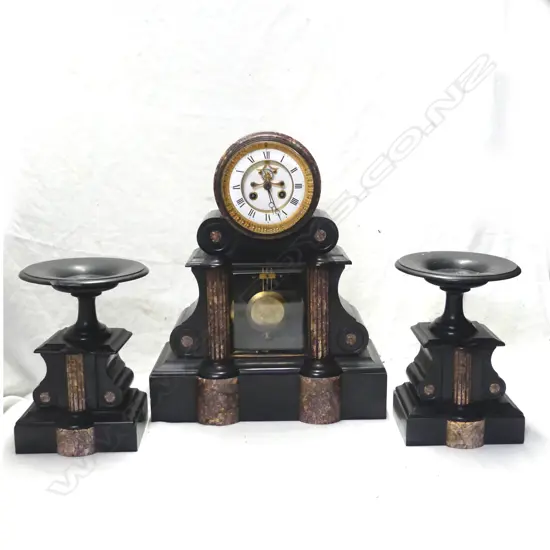 An impressive Victorian marble mantel clock and garniture