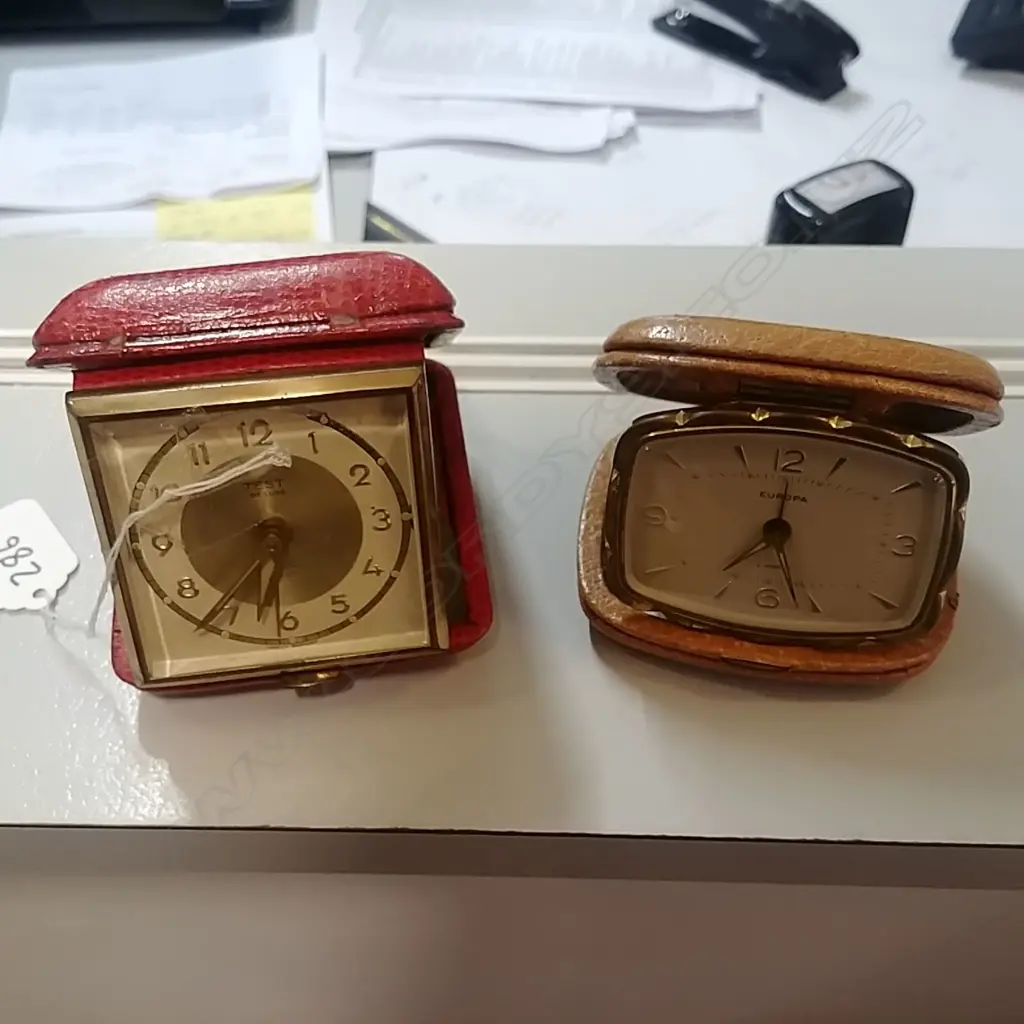 2 CASED TRAVEL CLOCKS  Image 1++