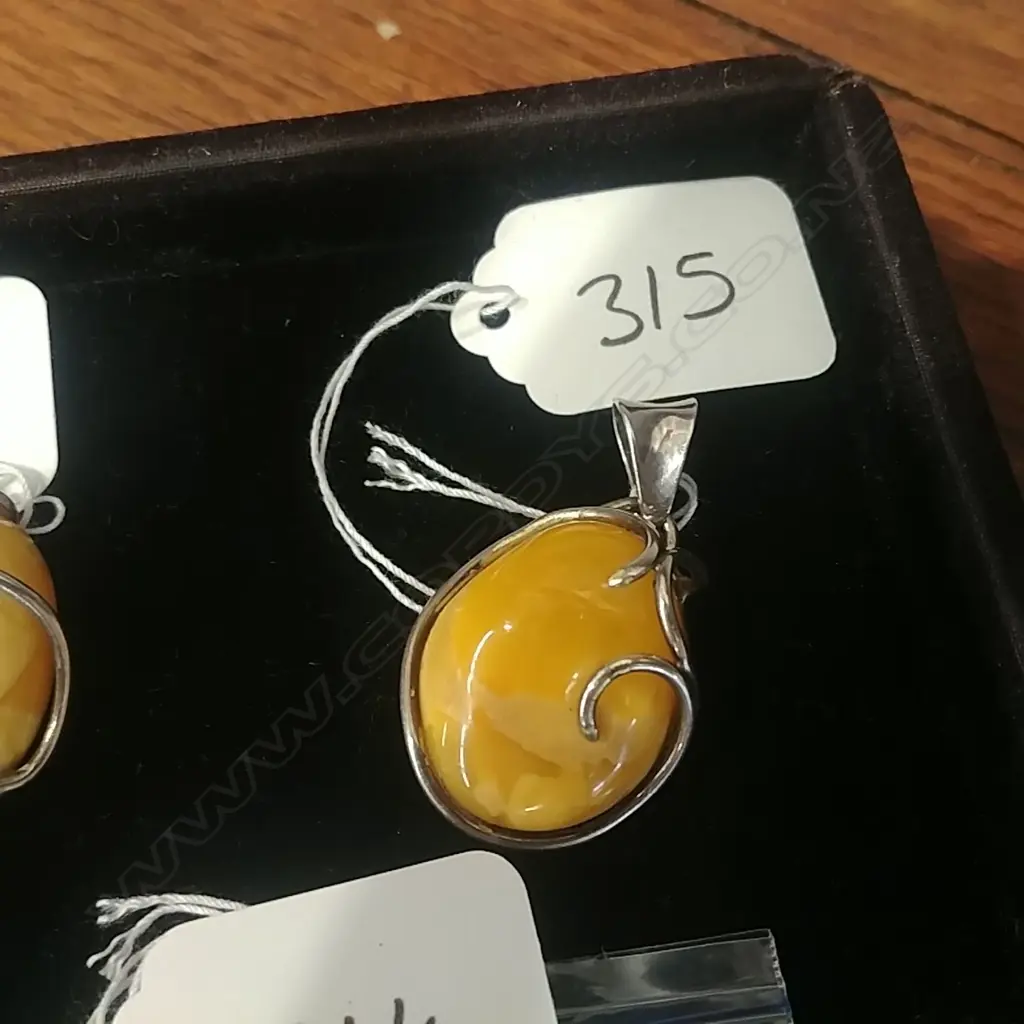 BUTTERSCOTCH AMBER PENDANT SILVER FRAME Image 1++
