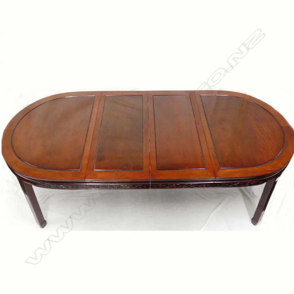 A Chinese rosewood dining table and chairs Image 1++