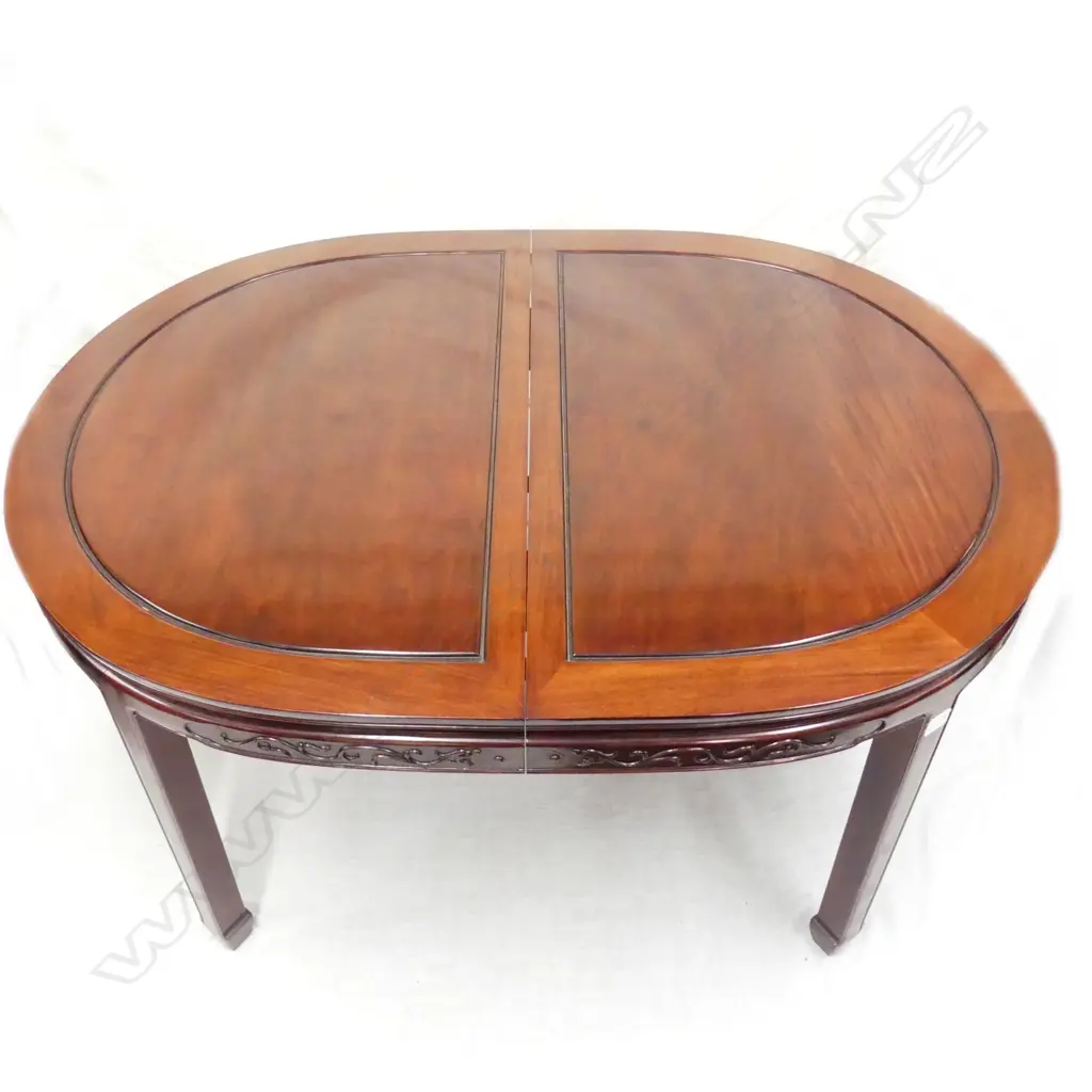 A Chinese rosewood dining table and chairs Image 1++