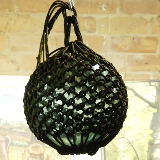 OLD GLASS FISHING FLOAT WITH NETTING