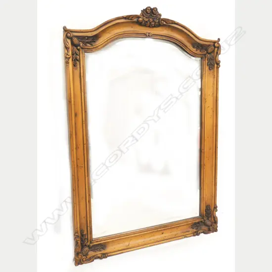 An impressive overmantel mirror