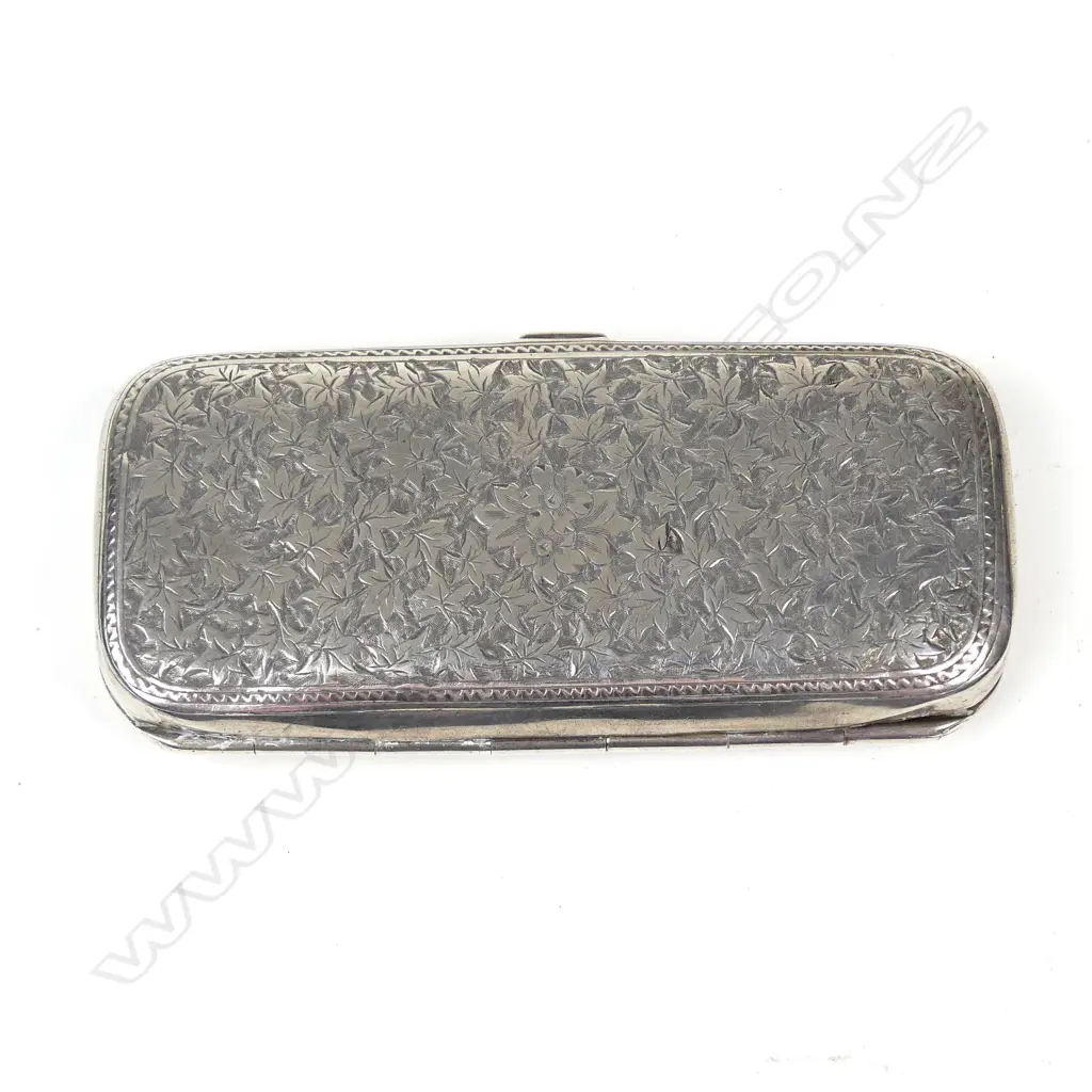 A silver cigarette case Image 1++