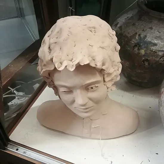CERAMIC BUST OF A YOUNG GIRL