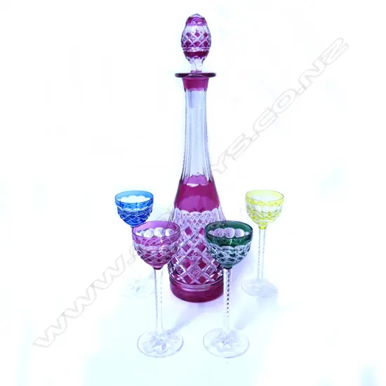 A Bohemian crystal decanter and four liqueur glasses