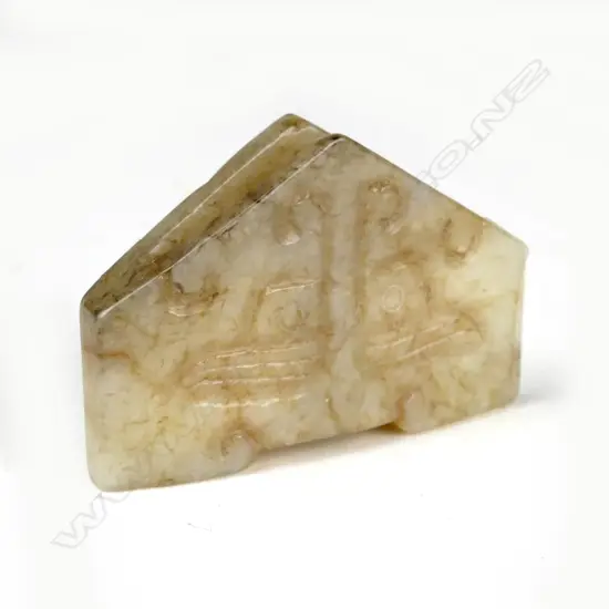 A Chinese jade sword chape