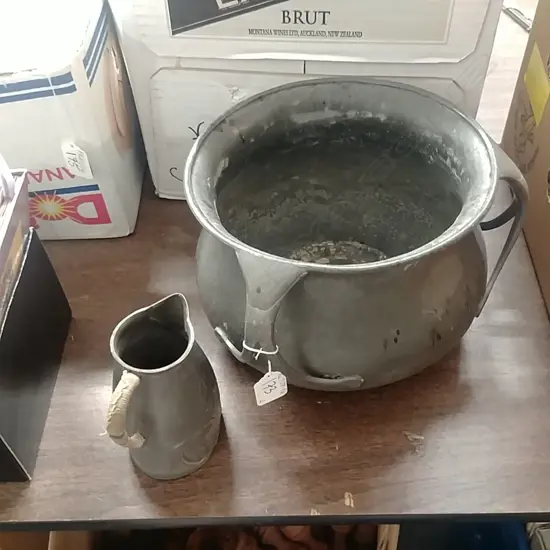 Two pieces of Liberty & Co. Tudric pewter