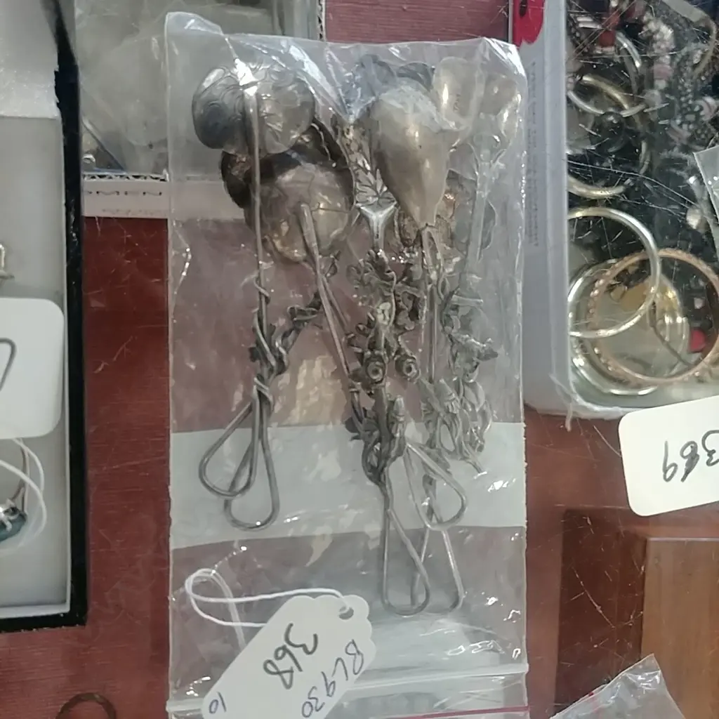 10 SMALL FANCY SILVER SPOONS Image 1++