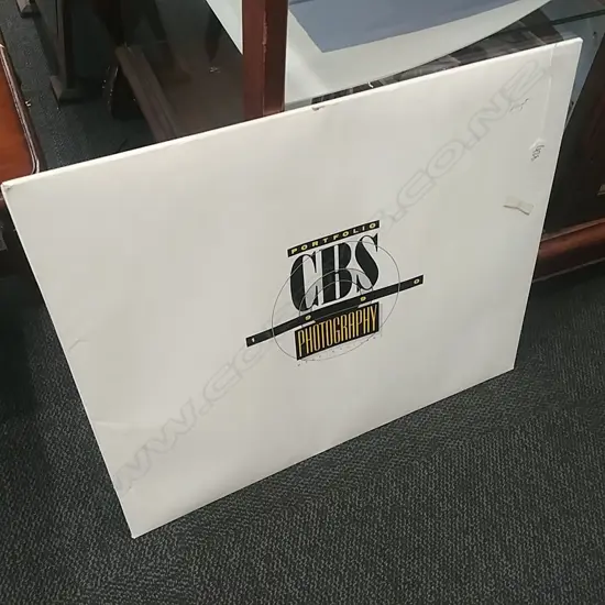 FOLIO OF SIGNED PHOTOGRAPHY 