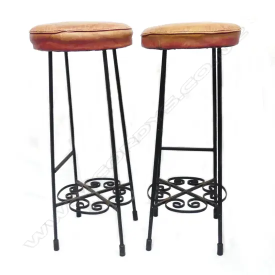 A pair of 1960s wrought iron stools