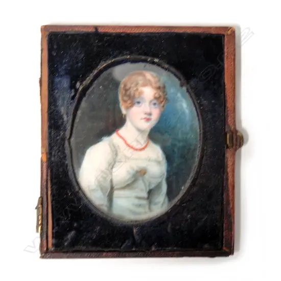 A 19thC oval portrait miniature hand painted on ivory