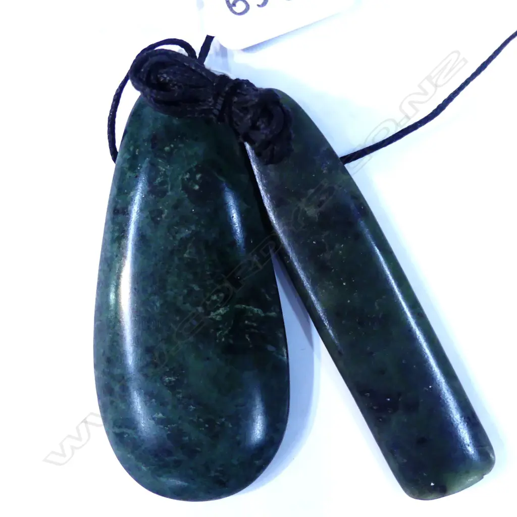 2 MIKE HIGGS CARVED GREEN STONE HEI PENDANTS Image 1++