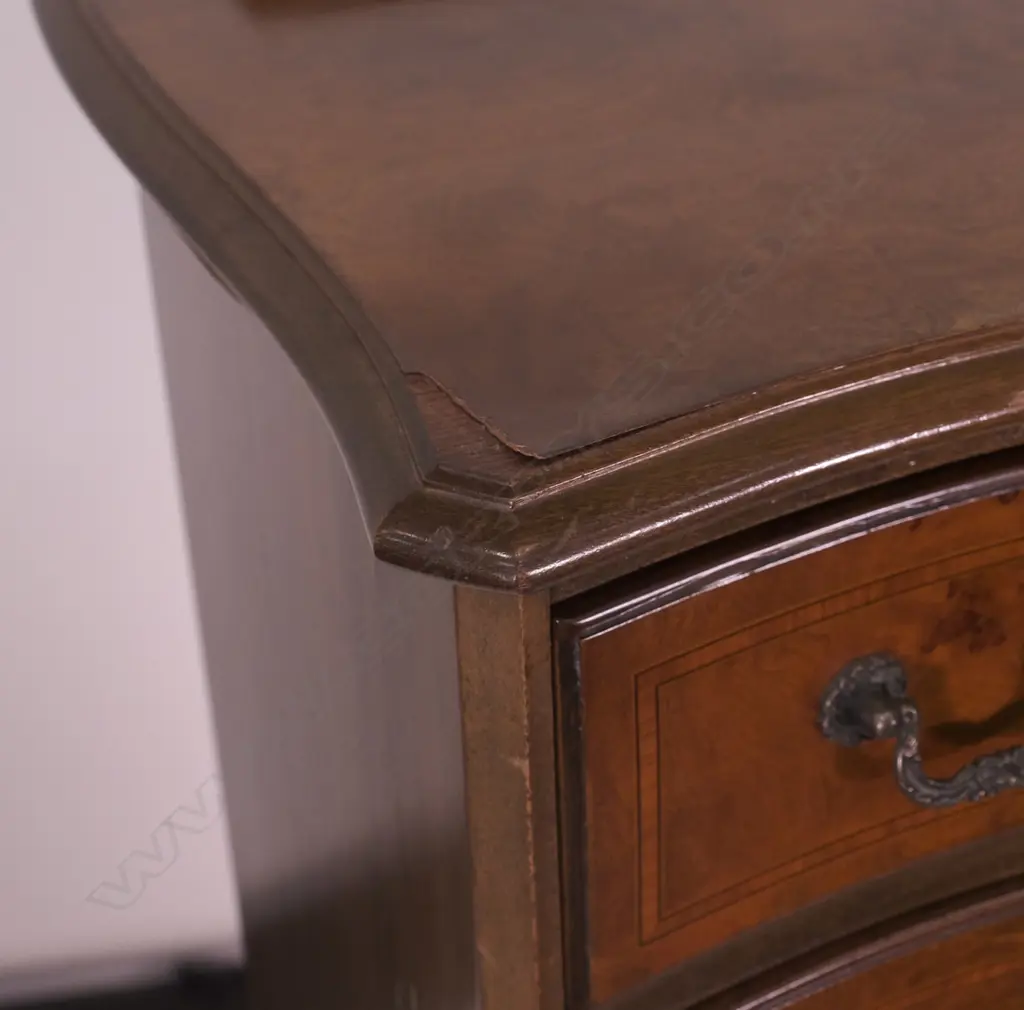 A WALNUT SHAPED FRONT 5 DRAWER TALLBOY, H 1160 MM SMALL VENEER DAMAGE TO TOP Image 1++