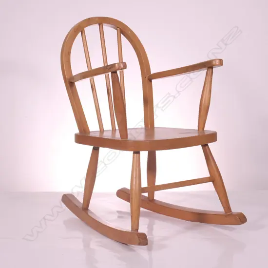  A PINE CHILD'S SPOKE BACK ROCKING CHAIR