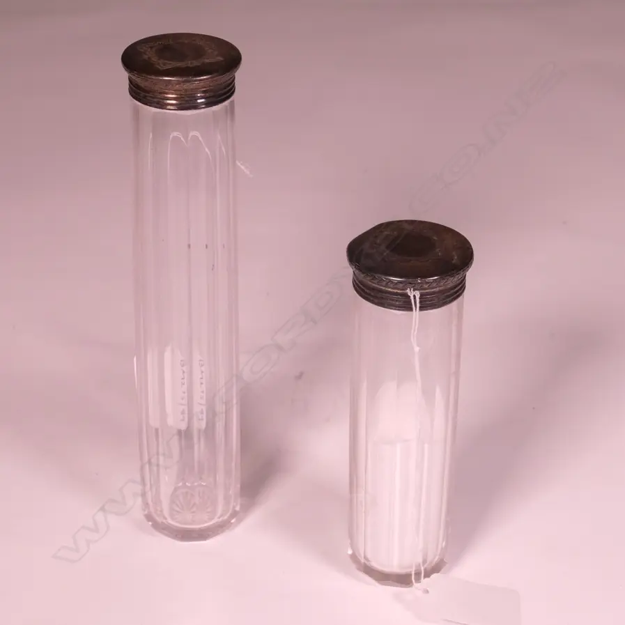 2 SILVER TOPPED BOTTLES Image 1++