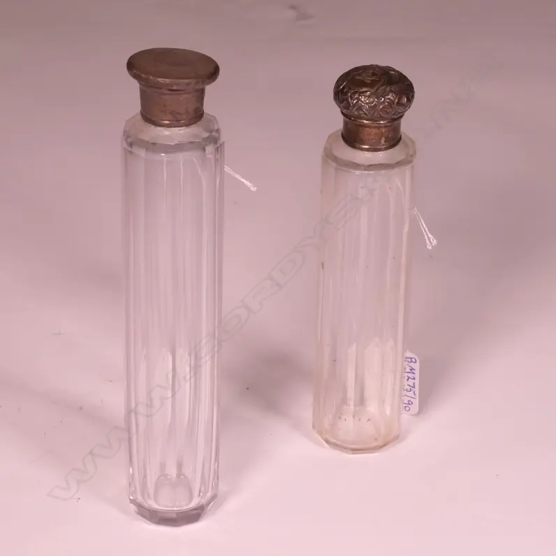 2 SILVER TOPPED BOTTLES Image 1++