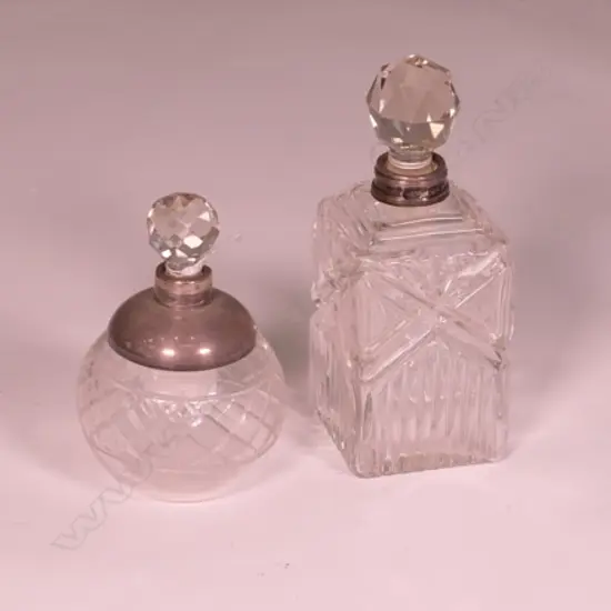 2 SILVER TOPPED DRESSING TABLE BOTTLES
