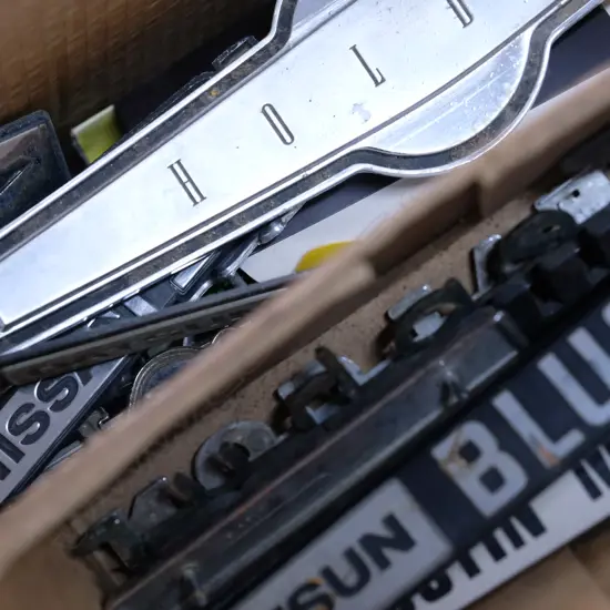 ASSORTED BOX OF CAR SYMBOLS AND OTHERS