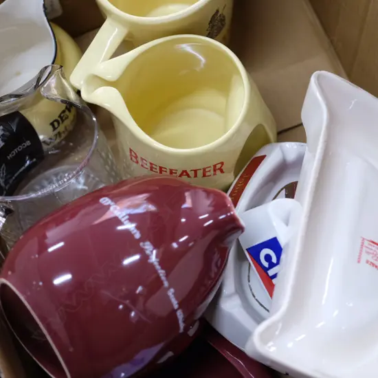 LOT ASST WHISKEY JUGS AND ASHTRAYS
