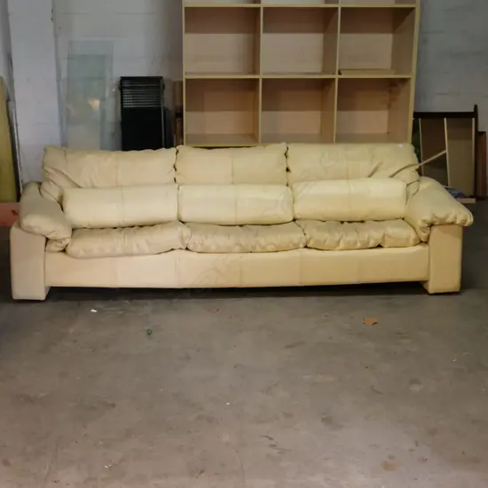 LONG LEATHER YELLOW SOFA. W. 2730MM