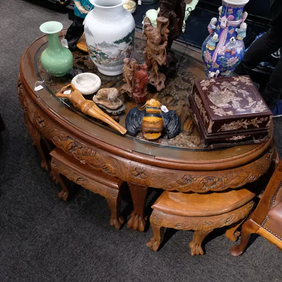 ORIENTAL STYLE CARVED OVAL TABLE W/ SIX STOOLS. TABLE W. 1180MM