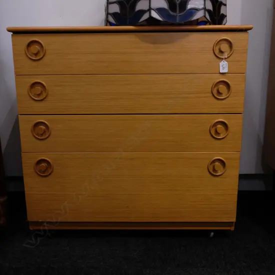 MID CENTURY 4 DRAWER CHEST.ON CASTORS, H. 740MM, W. 750MM, D. 395MM