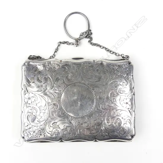 An Edwardian silver card case