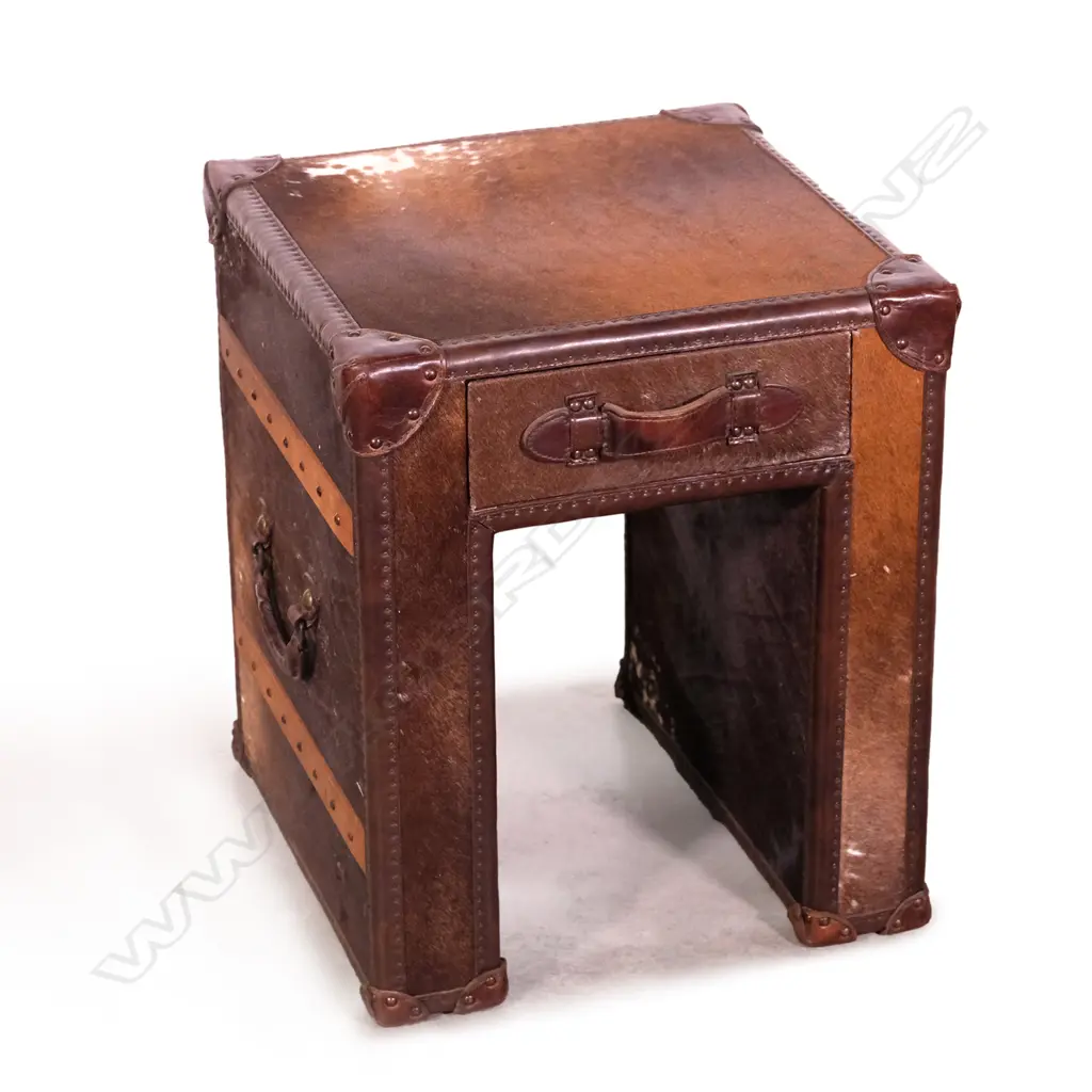A contemporary designer (Tiquila Kola) pony hide bedside cabinet Image 1++