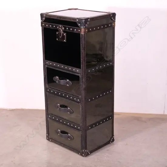 A contemporary designer (Tiquila Kola) black mirrored chest