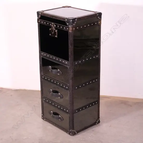 A contemporary designer (Tiquila Kola) black mirrored chest
