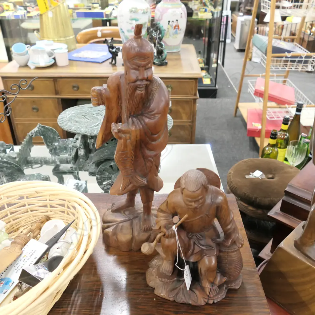 TWO SMALL CARVED WOODEN ASIAN FIGURES, TWO MEN.  Image 1++