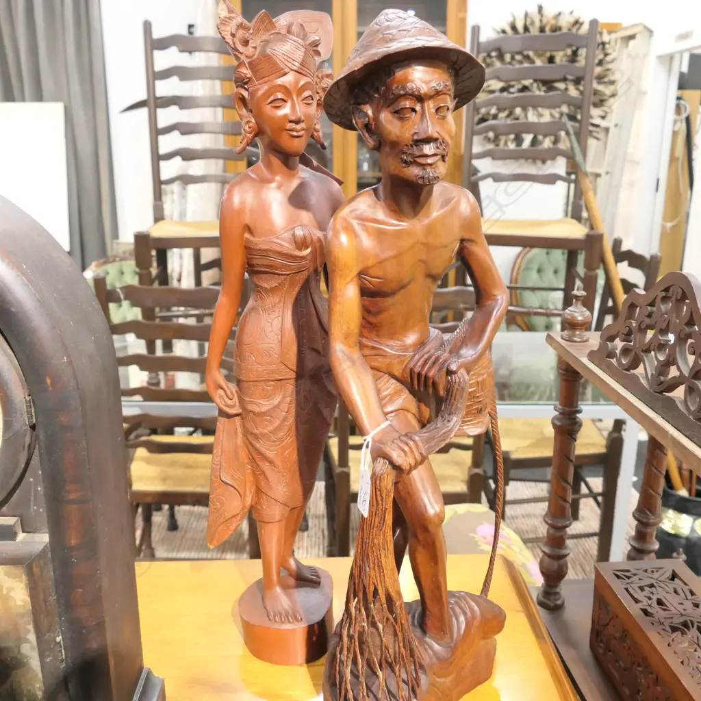 TWO LARGE ASIAN CARVED WOODEN FIGURES, A MAN AND A WOMAN Image 1++
