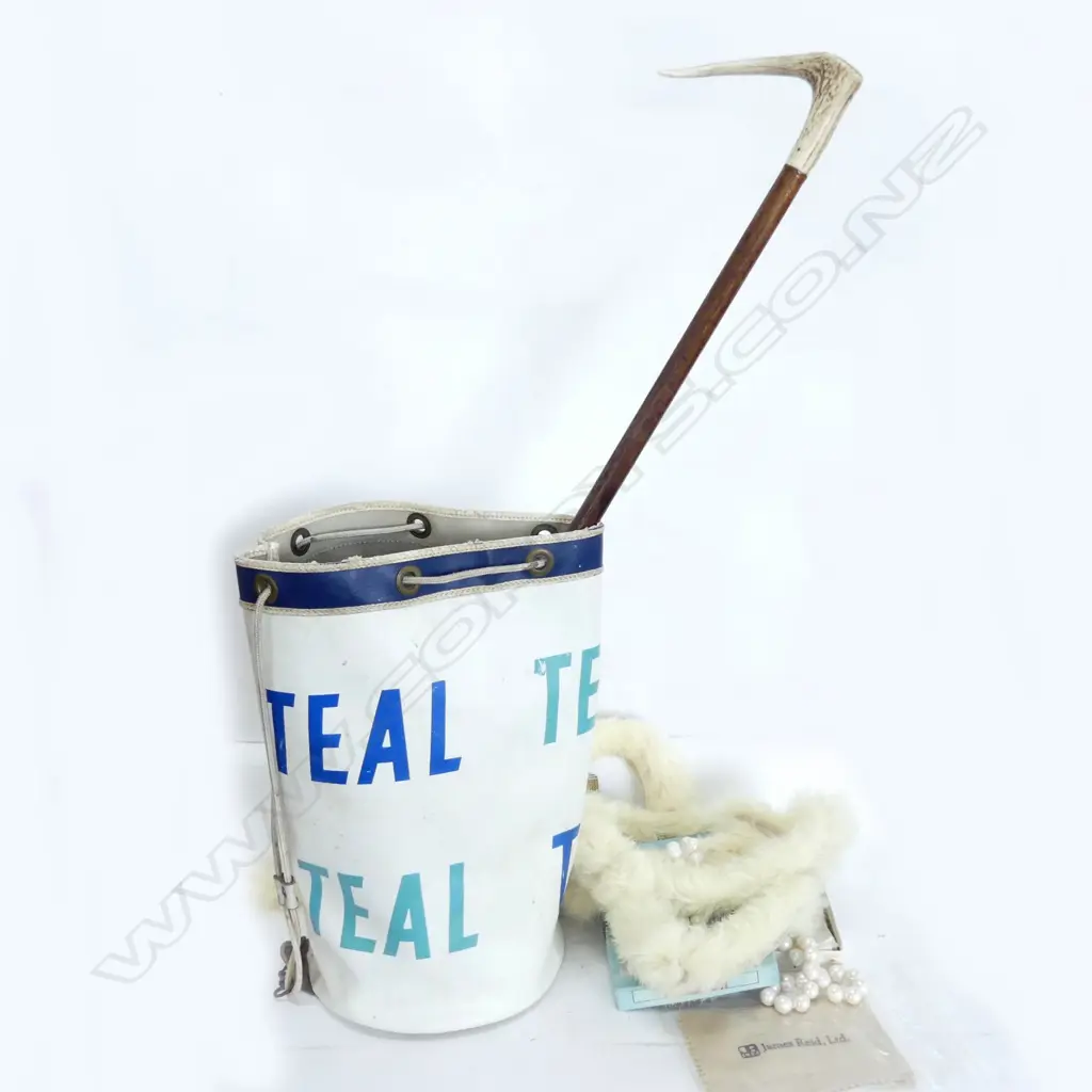 TEAL DUFFLE AND CONTENTS  Image 1++