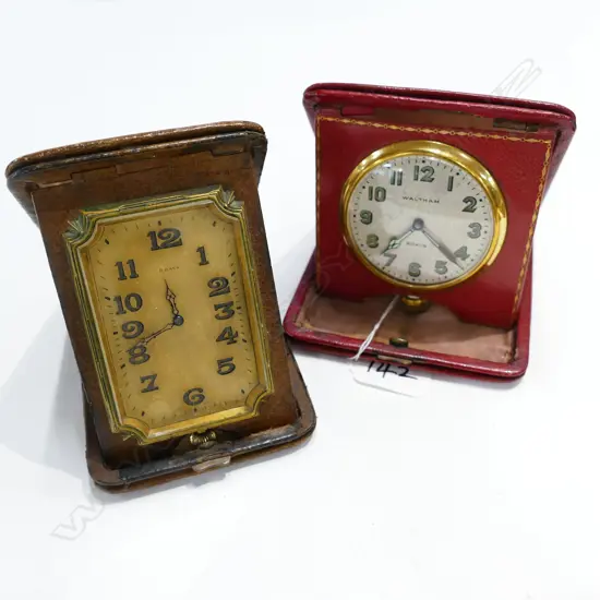 TWO FOLDING TRAVEL CLOCKS, ONE  BY WALTHAM, THE OTHER ART DECO. (AS-IS)
