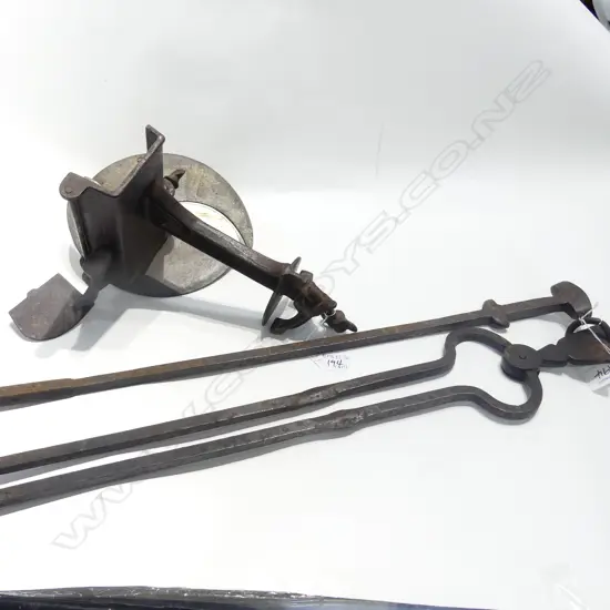 TWO FIRE IMPLEMENTS - TONG AND POKER, BEAN SLICER