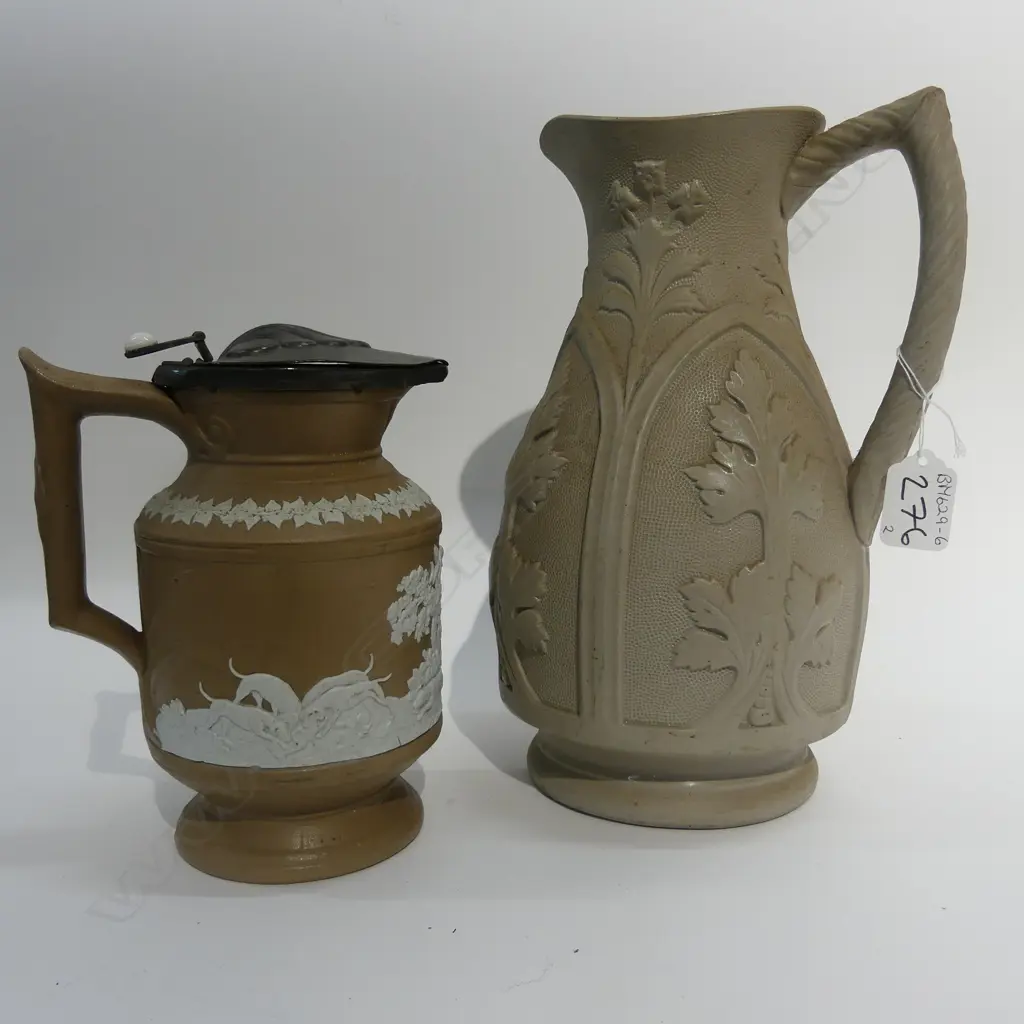 TWO VICTORIAN EARTHENWARE JUGS Image 1++