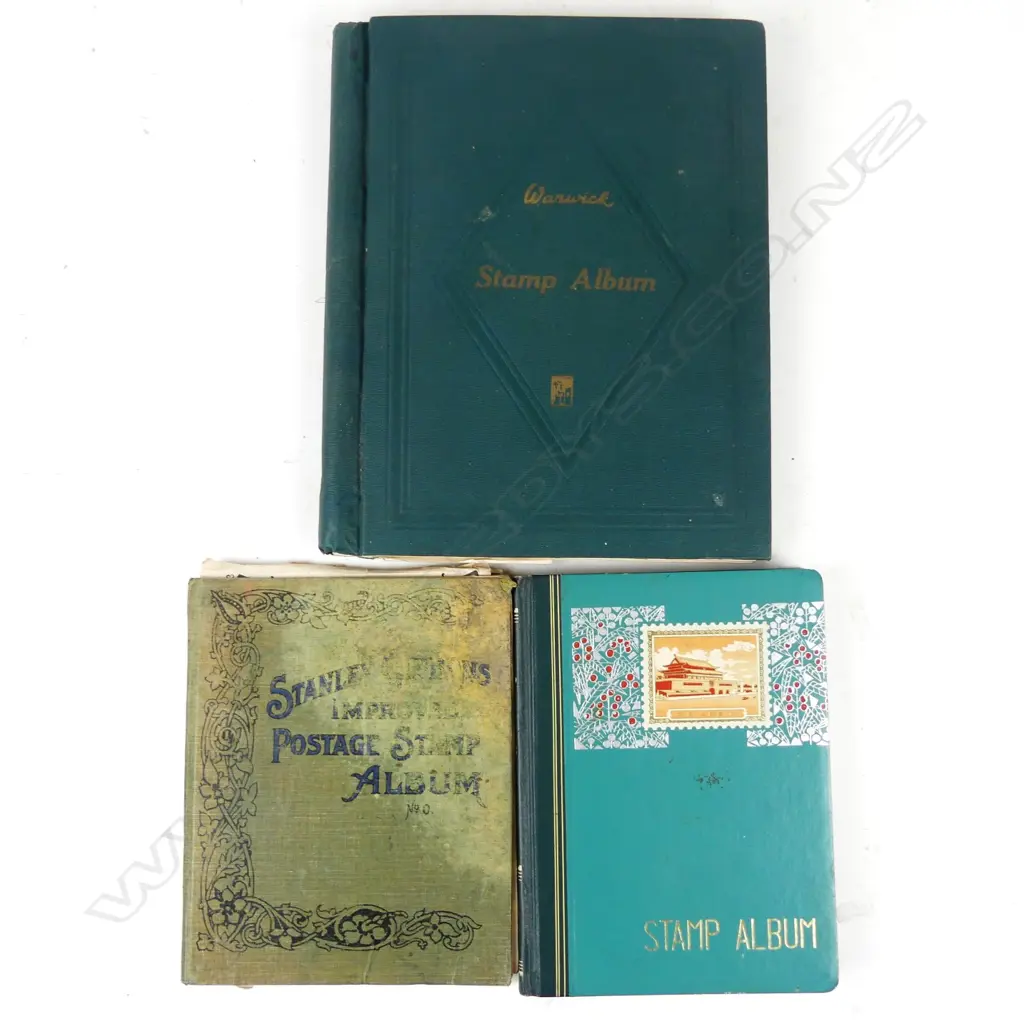 Three vintage stamp albums Image 1++