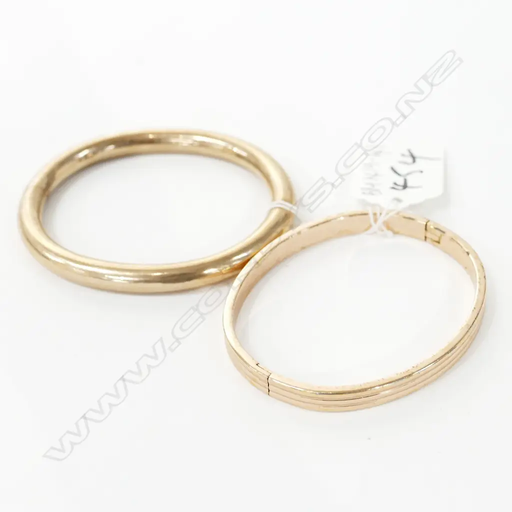 TWO GOLD PLATED BANGLES Image 1++
